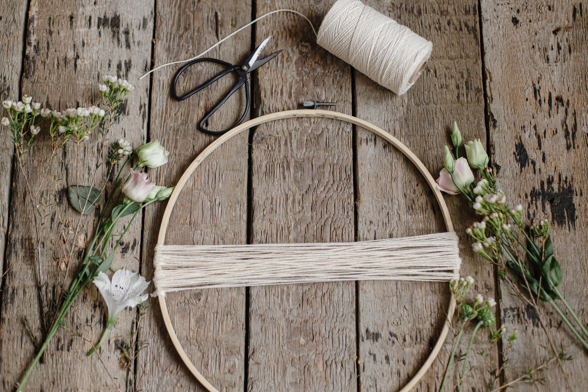 atelier workspace with threads and hoop